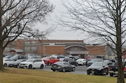 A teacher at Saint Thomas Aquinas High School was charged with manufacturing and possessing child sexual abuse material Tuesday, authorities said.