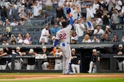 New York Mets' Juan Soto acknowledges the reaction of the crowd as he steps to the plate during the first inning of the 2025 Subway Series, Friday, May 16, 2025 in New York.