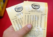 Mega Millions, Powerball and NJ Lottery logo photos and people buying tickets. Monday October, 22, 2018 NJ Advance Media for NJ.com