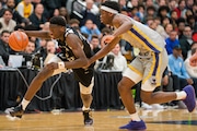 The No. 1 ranked high school basketball player in the class of 2025, AJ Dybantsa dribbles past his opponent. (Joseph Desrosiers / The Westfield News)