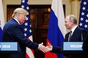 FILE - In this file photo taken on Monday, July 16, 2018, U.S. President Donald Trump shakes hand with Russian President Vladimir Putin at the end of the press conference after their meeting at the Presidential Palace in Helsinki, Finland. (AP Photo/Alexander Zemlianichenko, File) AP