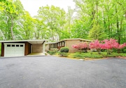 The four-bedroom, three-bathroom Mid-Century Modern ranch home is listed for sale for $985,000. 