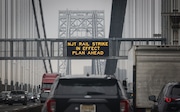 Sign alerts New York City-bound traffic on the George Washington Bridge to the NJ Transit rail strike, Friday, May 16, 2025 in New York.
